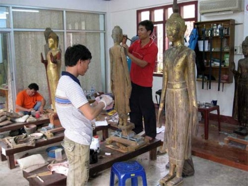 Restoring Wooden Buddha's in Luang Prabang
